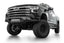 Addictive Desert Designs2022+ Chevrolet Silverado 1500 Black Label Front Bumper with offroad wheels and lighting.