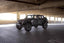 DV8 Offroad 07-23 Jeep Wrangler JK/JL & Gladiator JT FS-15 Series Front Bumper shown in parking garage.