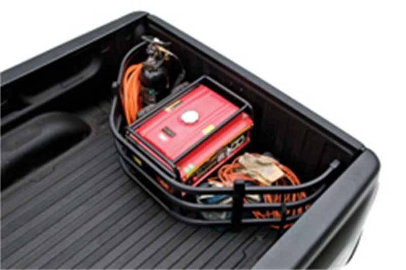 AMP Research 20-22 Jeep Gladiator (Does Not Work w/Tonneau Cvrs) Bedxtender HD Sport - Black showing cargo secured in the truck bed.