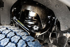 ICON 21-23 Ford F150 Tremor 2.5-3in 2.5 Series VS IR Coilover Kit close-up with off road parts