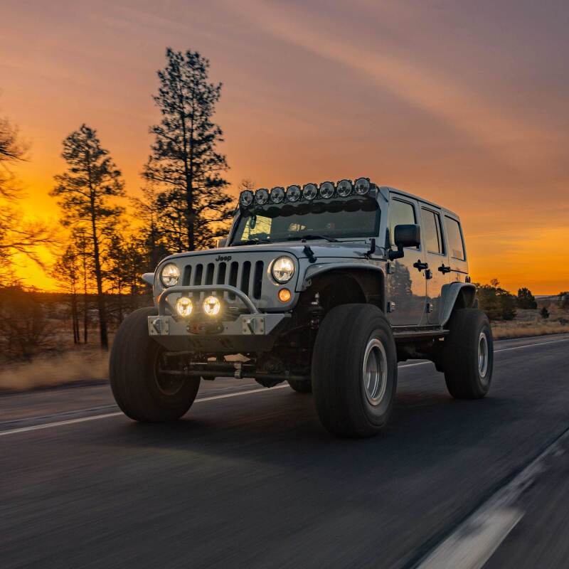 KC HiLiTES Gravity Titan LED 6in. - Pair Pack (SAE Driving Beam) on modified Jeep at sunset