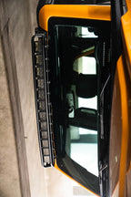 DV8 21+ Ford Bronco Curved Light Bracket for 12 3in. Pod Lights mounted on orange Ford Bronco.