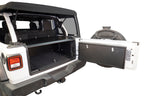 Tuffy Deluxe Enclosure For Jeep Wrangler W/ Subwoofer installed with open lid showcasing secure storage.