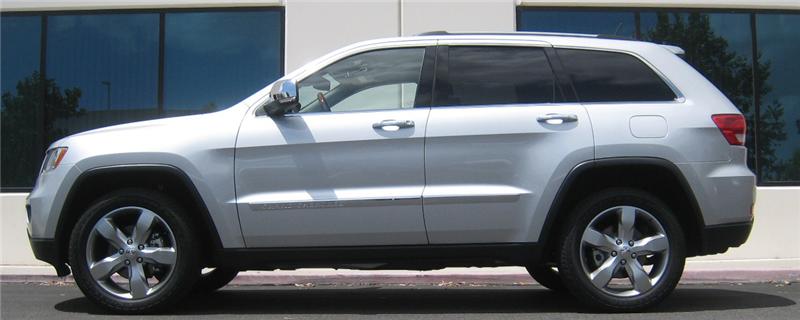 Eibach SUV Pro-Kit for 11-12 Jeep Grand Cherokee 2WD/4WD V6/V8 side view with offroad wheels and performance offroad parts