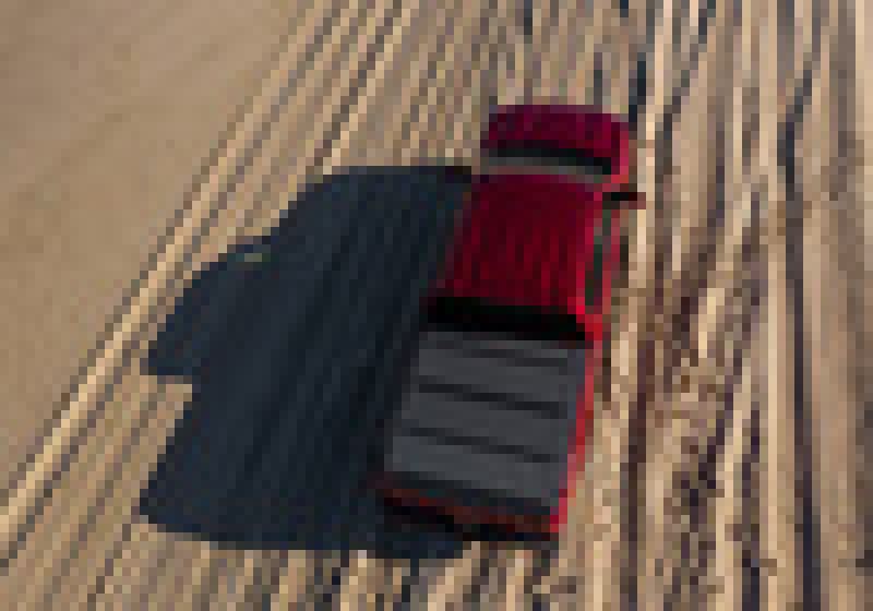 BAK 19-20 Chevy Silverado 1500 6ft 6in Bed BAKFlip MX4 Matte Finish on offroad terrain.