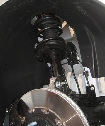 Eibach Pro-Kit for 10-12 Chevy Camaro SS Coupe/Conv 6.2L V8 / 12-13 ZL1 Coupe/Conv suspension upgrade showing spring and strut. Main image