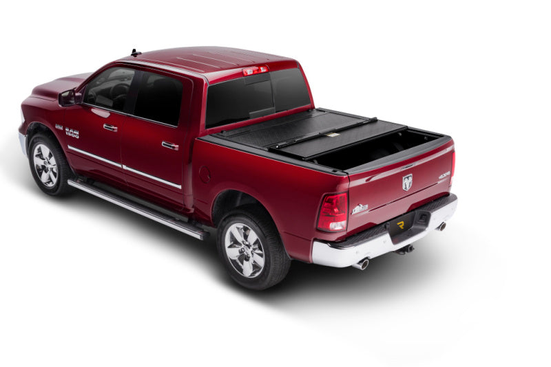 BAK 2022+ Toyota Tundra 5.5ft Bed BAKFlip F1 Bed Cover on red truck