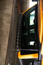 DV8 21+ Ford Bronco Curved Light Bracket for 12 3in. Pod Lights on yellow truck