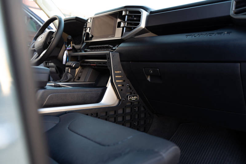 DV8 Offroad 22-23 Toyota Tundra Center Console Molle Panels/Device Mount in truck interior