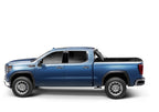 BAK 19-20 Chevy Silverado 1500 6ft 6in Bed BAKFlip MX4 Matte Finish truck with offroad wheels and suspension lift kits.