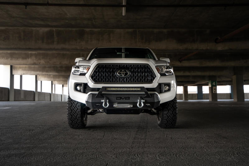 DV8 Offroad 2016+ Toyota Tacoma Center Bumper in garage view