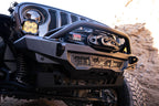 DV8 Offroad 18-23 Wrangler JL/Gladiator JT Spec Series Front Bumper with winch, designed for offroad performance upgrades.