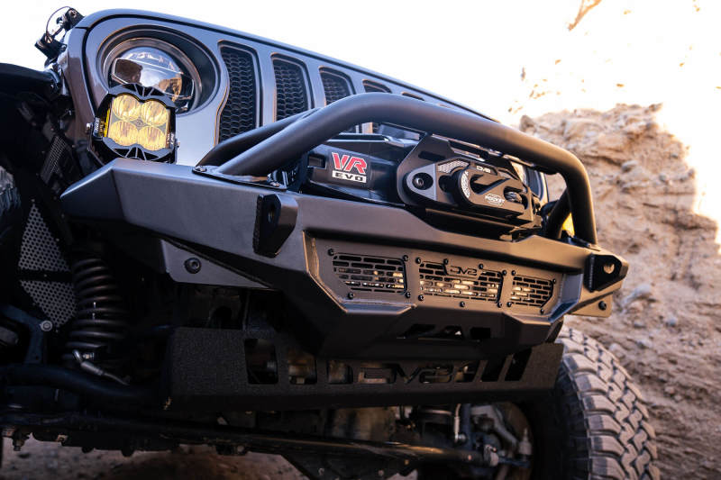 DV8 Offroad 18-23 Wrangler JL/Gladiator JT Spec Series Front Bumper with winch, designed for offroad performance upgrades.