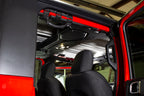 Fishbone Offroad Grab Handles w Three Straps mounted in red Jeep.