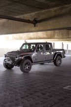 DV8 Offroad 07-23 Jeep Wrangler JK/JL & Gladiator JT FS-1 Series Stubby Front Bumper in parking garage.