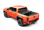 BAK 16-20 Toyota Tacoma 6ft Bed BAKFlip G2 on an orange truck