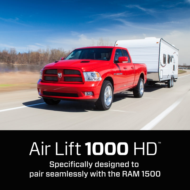 Air Lift 1000HD Rear Air Spring Kit for 09-18 Dodge Ram 1500 towing a trailer.