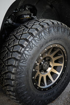 ICON Compression 17x8.5 6x5.5 0mm Offset 4.75in BS 106.1mm Bore Bronze Wheel on offroad tire