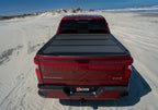BAK 07-20 Toyota Tundra 6ft 6in Bed BAKFlip MX4 Matte Finish on truck at the beach