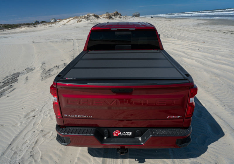 BAK 07-20 Toyota Tundra 6ft 6in Bed BAKFlip MX4 Matte Finish on truck at the beach