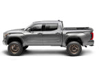 Retrax 2007-2020 Toyota Tundra CrewMax 5.5ft Bed RetraxPRO XR with Deck Rail System on offroad wheels.