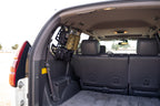 DV8 Offroad 03-09 Lexus GX 470 Rear Window Molle Storage Panels installed in vehicle interior.