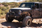DV8 Offroad 2018+ Jeep Wrangler JL Front Inner Fenders - Black on modified Jeep in outdoor terrain.