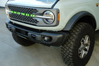 DV8 Offroad 2021 Ford Bronco Capable Bumper Slanted Front License Plate Mount on off-road vehicle.