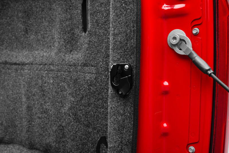 AMP Research 04-22 Ford F-150 (Excl. 04 Heritage) / 07-21 Toyota Tundra Bedxtender HD Max - Black truck bed latch close-up