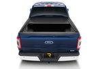 Retrax 21-22 Ford F-150 Super Crew/Super Cab (Incl. 2022 Lightning) 5.5ft Bed RetraxONE MX on a blue Ford truck rear view.