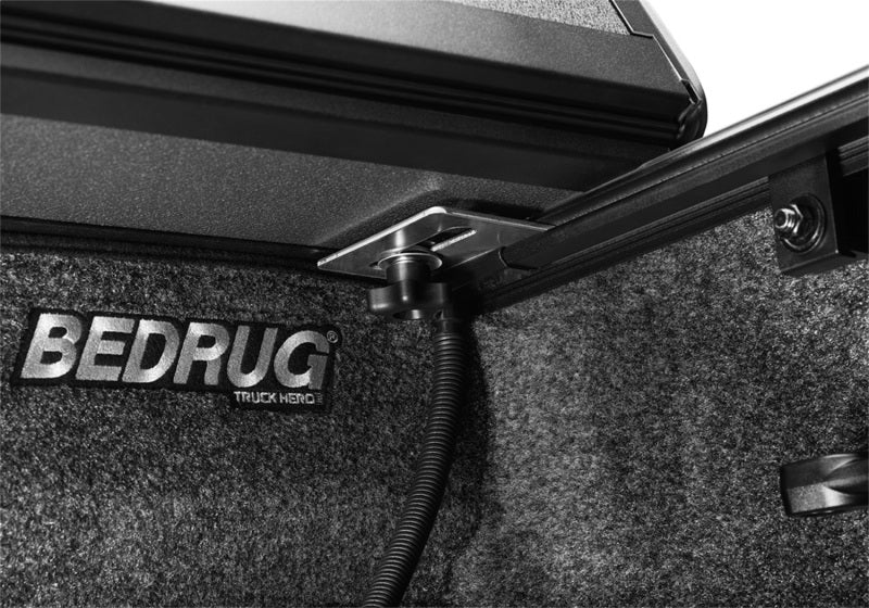 BAK 21-22 Ford F-150 (Incl. 2022 Lightning) BAKFlip MX4 5.7ft Bed Cover - Matte Finish interior view with BEDRUG logo