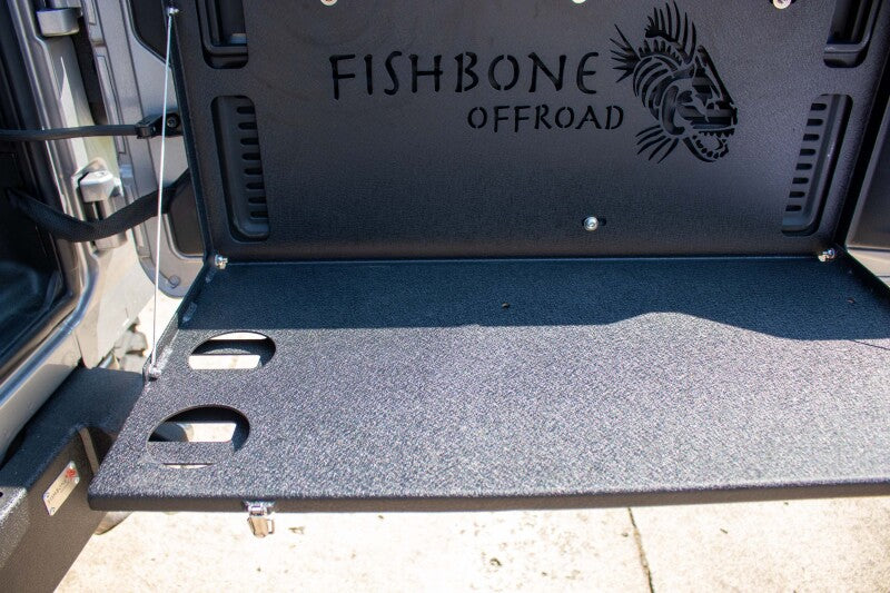 Fishbone Offroad 2018+ Jeep Wrangler JL Tailgate Table setup for outdoor adventures.