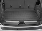 WeatherTech 2021+ Chevrolet Suburban Trunk Cargo Liner - Black in vehicle trunk.