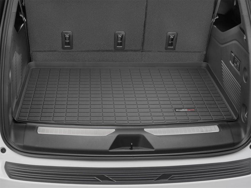 WeatherTech 2021+ Chevrolet Suburban Trunk Cargo Liner - Black in vehicle trunk.