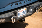DV8 Offroad 16-23 Toyota Tacoma MTO Series Rear Bumper close-up with recovery gear hooks