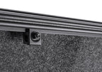Detail of BAK 17-23 Ford Super Duty Revolver X4s 6.10ft Bed Cover featuring matte black finish and durable hardware.