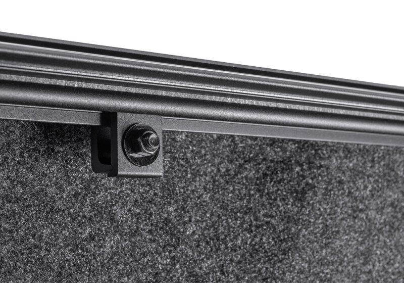 Detail of BAK 17-23 Ford Super Duty Revolver X4s 6.10ft Bed Cover featuring matte black finish and durable hardware.
