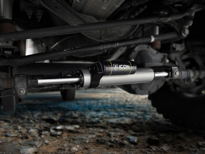 ICON 05-22 Ford Super Duty 2.5 Power Brake Steering Stabilizing Kit installed under truck for offroad performance upgrades.