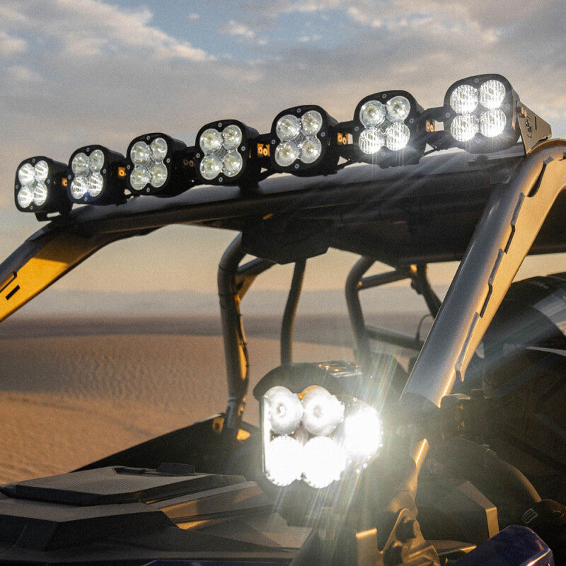 Baja Designs Polaris Pro-R 7 XL Linkable Roof Bar Kit installed on off-road vehicle, enhancing nighttime visibility.