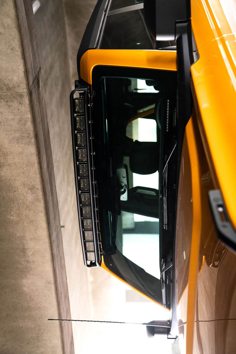 DV8 21+ Ford Bronco Curved Light Bracket for 12 3in. Pod Lights installed above windshield