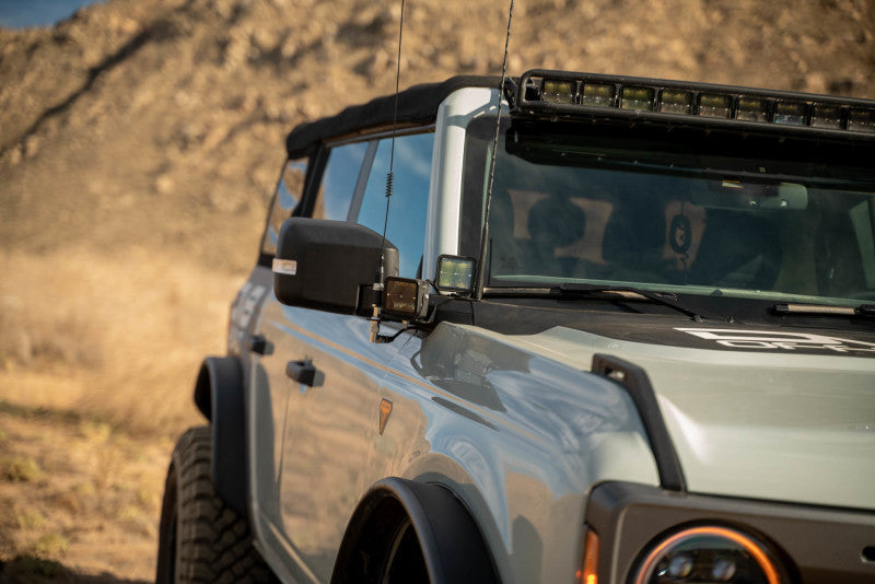 DV8 Offroad 2021 Ford Bronco A Pillar Dual Light Pod Drop Mounts on off-road truck