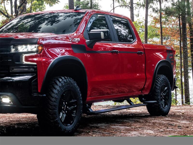 AMP Research 2015-2016 Chevy Silverado 2500/3500 Double/Crew Cab PowerStep Plug N Play - Black on red truck