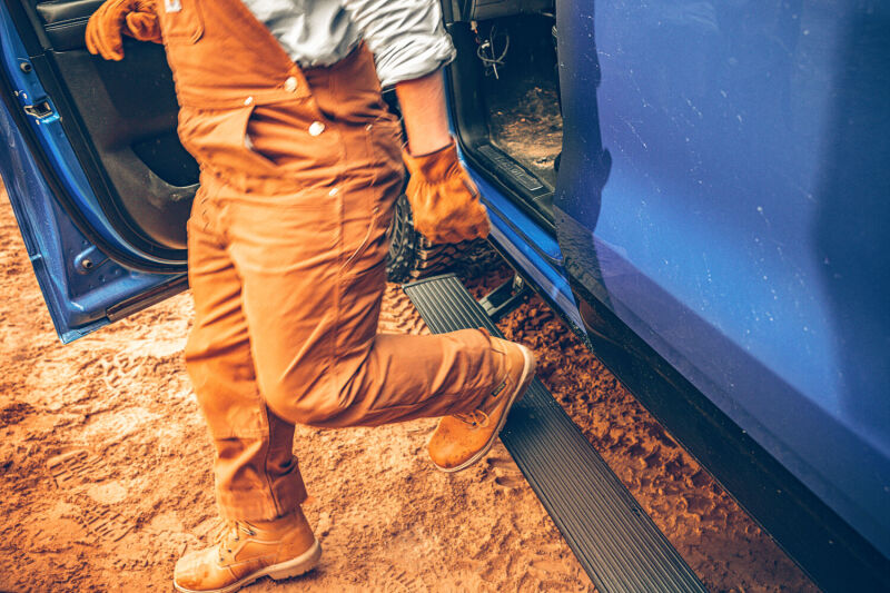 AMP Research 19-22 Ram 1500 All Cabs PowerStep Plug N Play - Black (Incl OEM Illumination) in action