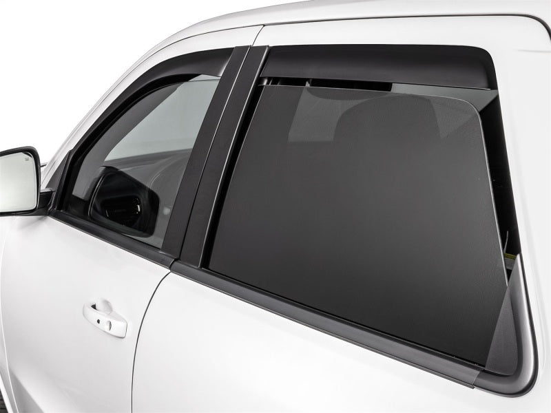 WeatherTech 11-23 Dodge Durango Front & Rear Side Window Deflectors - Dark Tint on vehicle Main image