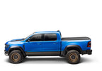 BAK 19-24 Dodge Ram (w/o Ram Box) Revolver X4ts 5.7ft Bed Cover w/T-Slot Rails on blue truck