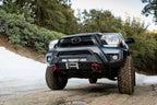 Body Armor 4x4 12-15 Toyota Tacoma HiLine Front Winch Bumper on off-road truck
