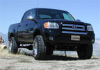Tuff Country 05-06 Toyota Tundra 4x4 & 2wd 5in Lift Kit (w/Steering Knuckles) SX8000 Shocks on black truck
