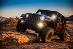 Fox 2018+ Jeep Wrangler JL 2.0 Performance Series 9.6in Smooth Body IFP Front Shock 2-3in. Lift on rocky terrain.