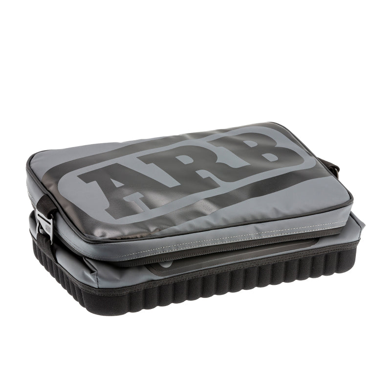 ARB Cooler Bag Charcoal w/ Red Highlights 15in L x 11in W x 9in H Holds 22 Cans, perfect for offroad adventures.