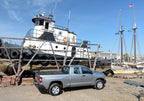 BAK 00-06 Toyota Tundra Double Cab 6ft 2in Bed BAKFlip G2 on job site.